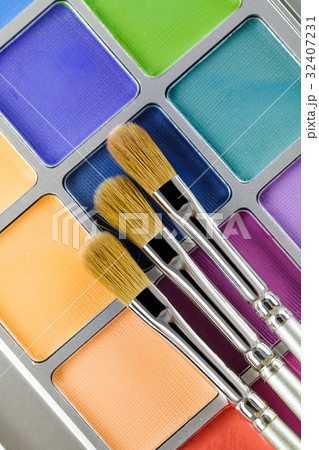 Palette of multicoloredeye shadow and makeup brush Palette of multicoloredeye shadow and makeup brush 32407231