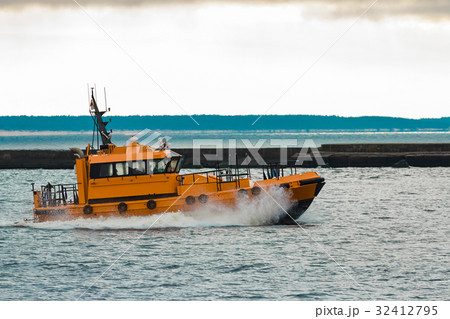 Orange pilot ship 32412795