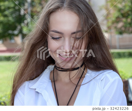 Portrait of a teenage girl outdoors Portrait of a teenage girl outdoors 32423226