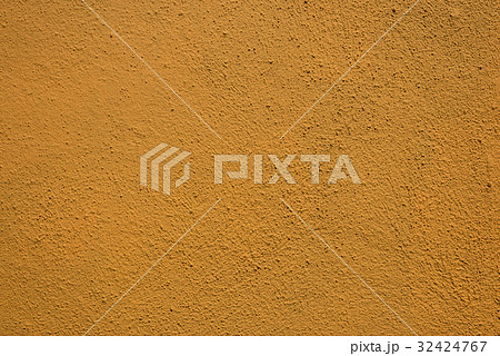 Texture from brown plaster on wall 32424767