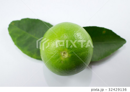 lemon and green leaf isolated on white background 32429136