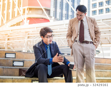 Business partner discussing together plan. Business partner discussing together plan. 32429161