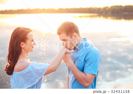 Marriage proposal on sunset. Betrothal  32431138