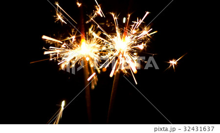 Burning Sparklers. Christmas and New Year lights. 32431637