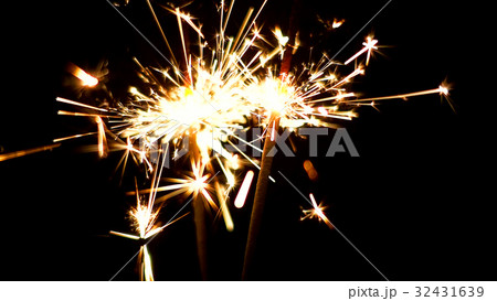 Burning Sparklers. Christmas and New Year lights. 32431639