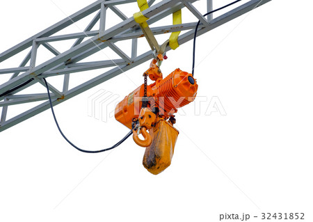 Orange hoist hangs on a steel frame Orange hoist hangs on a steel frame 32431852