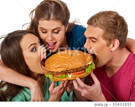 Hamburger fast food in people friends hands . Hamburger fast food in people friends hands . 32431935