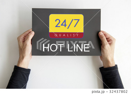 Hands holding a banner with 24/7 service 32437802