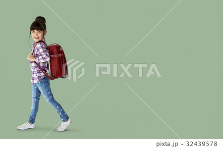 Young asian kid student with a backpack portrait Young asian kid student with a backpack portrait 32439578