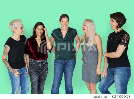 Happiness group of girlfriends smiling and talking together 32439913