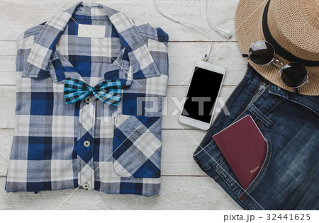 Top view accessoires to travel with man clothing. 32441625