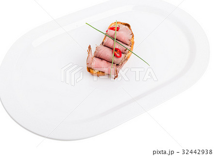 Bruschetta with roast beef and scallions. Bruschetta with roast beef and scallions. 32442938