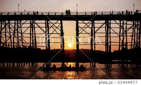Silhouetted bridge at sunset 32444977
