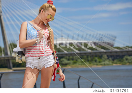 sexy blonde girl posing on a vintage roller skate sexy blonde girl posing on a vintage roller skate 32452792