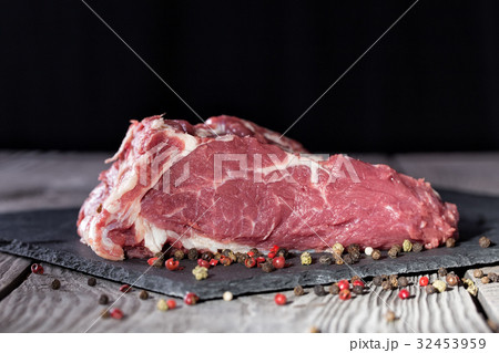 A piece of fresh steamed meat for steak on a table 32453959