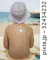 three years old girl on the beach 32454232
