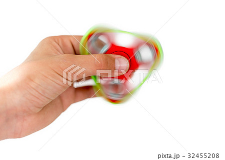 Fidget spinner. Red hand spinner, fidgeting hand Fidget spinner. Red hand spinner, fidgeting hand 32455208