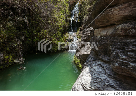Waterfall on beautiful mountain lake 32459201