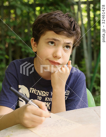teenager boy thinking write letter composition writing  32461428