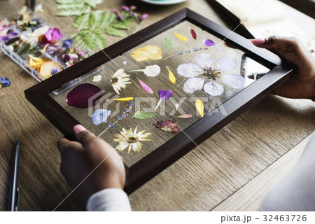 Dry flowers craft decorative on wooden table 32463726