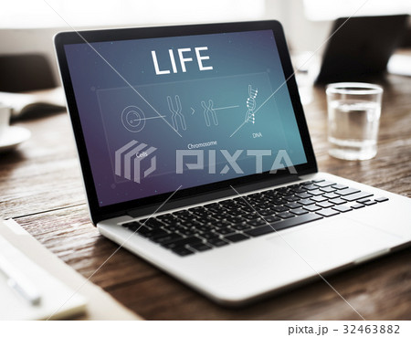 Laptop on the table with DNA Cells chromosome icons 32463882