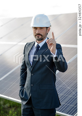 Businessman making a choice in favor of solar Businessman making a choice in favor of solar 32464357