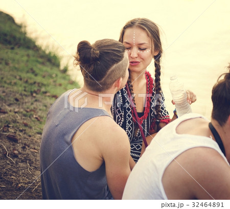 Group of Friends Drinking Beers Enjoying Music Festival together 32464891