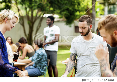 Group of diverse friends cooking barbecue together 32465688