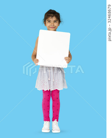 Happiness little girl smiling holding blank placard Happiness little girl smiling holding blank placard 32468679