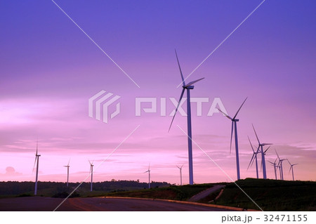 Wind turbine farm during beautiful sunset 32471155