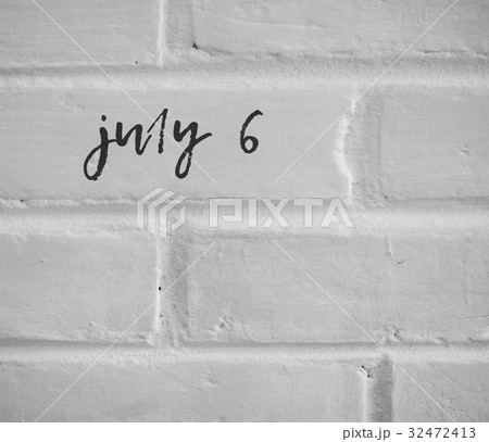 july 6 WRITTEN ON WHITE PLAIN BRICK WALL july 6 WRITTEN ON WHITE PLAIN BRICK WALL 32472413