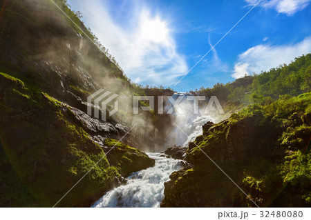 Giant Kjosfossen waterfall in Flam - Norway 32480080