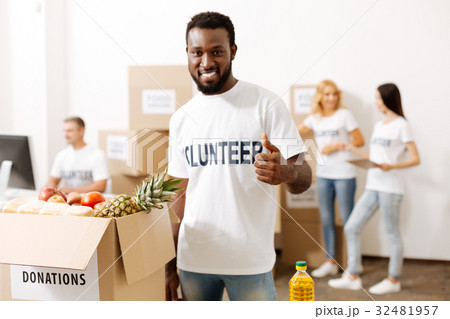 Lively admirable guy enjoying volunteer experience 32481957