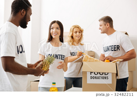 Inspired volunteers working on another shipment of Inspired volunteers working on another shipment of 32482211