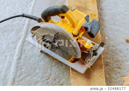 Wood cutting with circular saw 32488177