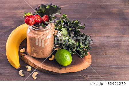 Jar of smoothie with strawberry and kale Jar of smoothie with strawberry and kale 32491279