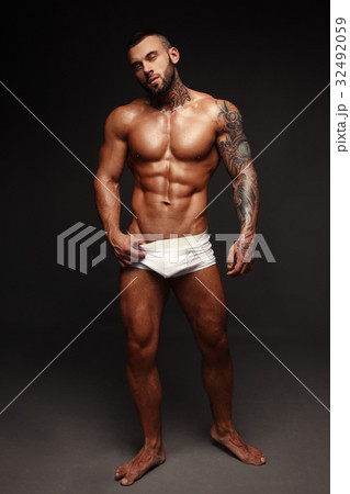 Sexy closeup portrait of handsome topless male 32492059