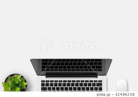 Modern workplace with notebook and little tree copy space on gray background. Top view. Flat lay style. 32496238