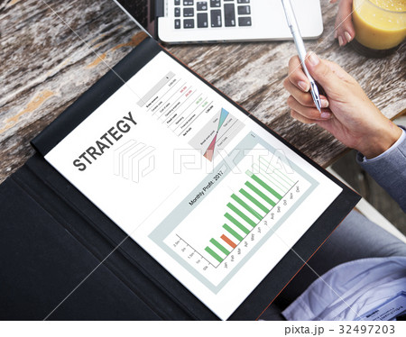 Hands working on notebook network graphic overlay Hands working on notebook network graphic overlay 32497203