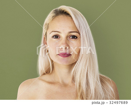 Woman standing and posing for photoshoot Woman standing and posing for photoshoot 32497689