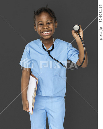 Little girl with doctor dream job smiling 32498116