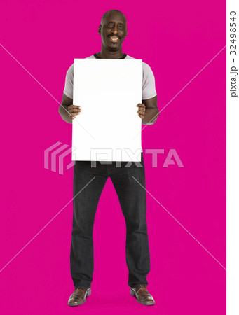 African descent man holding placard African descent man holding placard 32498540