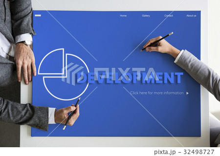 Hands working on network graphic overlay billboard on table 32498727