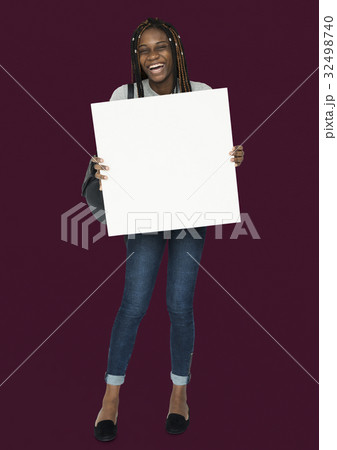 African woman holding copyspace placard African woman holding copyspace placard 32498740