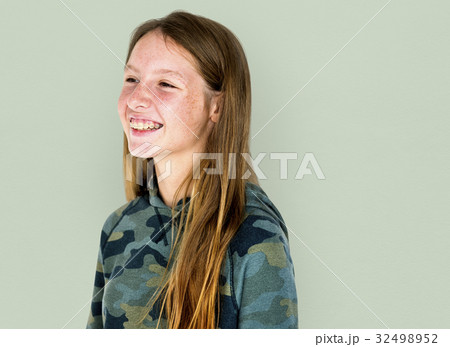 Girl smiling casual studio portrait 32498952