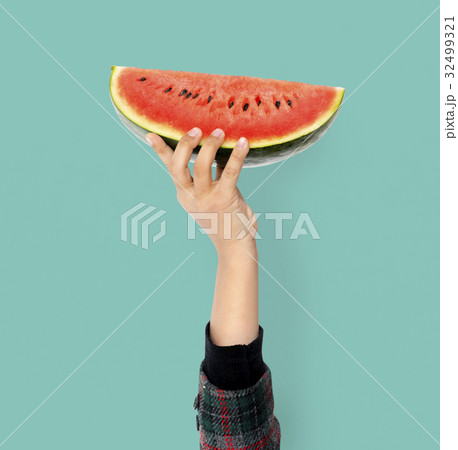 Hand Holding Watermelon Isolated Concept Hand Holding Watermelon Isolated Concept 32499321