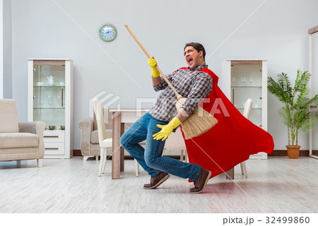 Super hero cleaner working at home 32499860