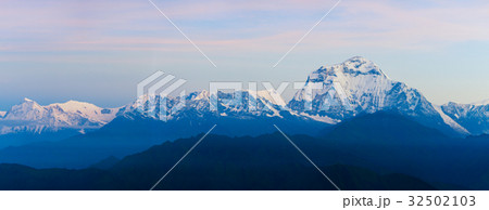 View of snowy mountain before sunrise. View of snowy mountain before sunrise. 32502103