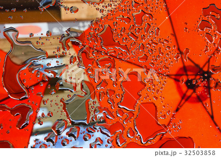 Red umbrella in reflection Red umbrella in reflection 32503858