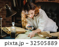 funny woman looking through a magnifying glass to 32505889
